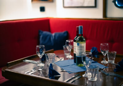 Noorderlicht onboard saloon set up for dinner